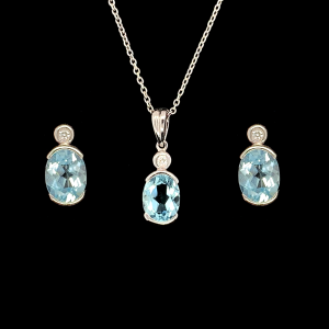 Diamond and Aquamarine Pendant And Earrings